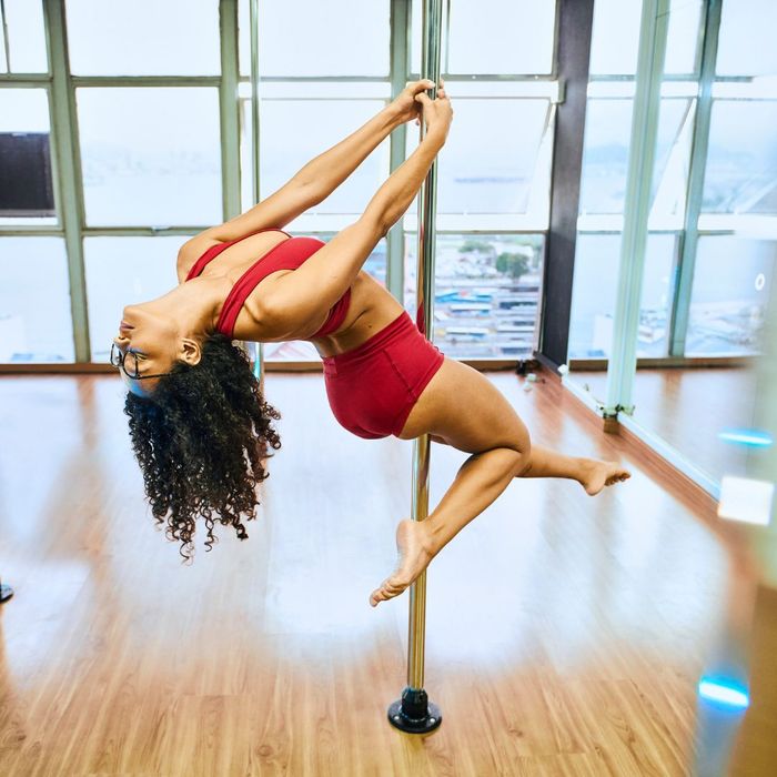 Woman pole dancing Woman pole dancing