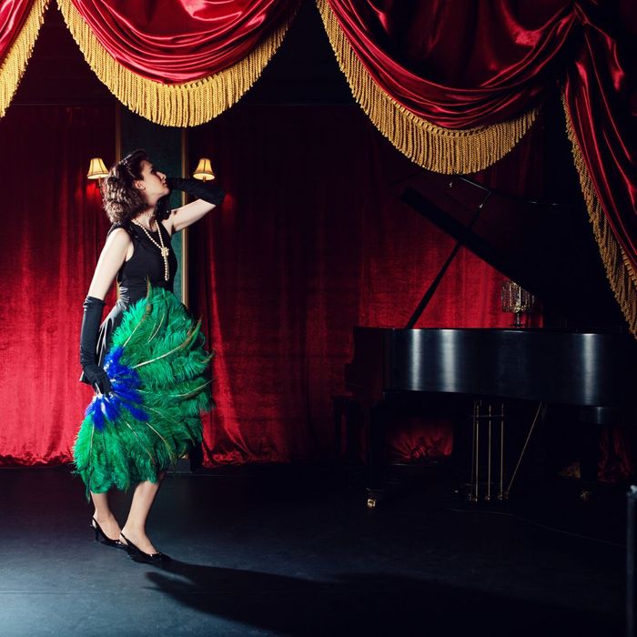 burlesque dancer with piano